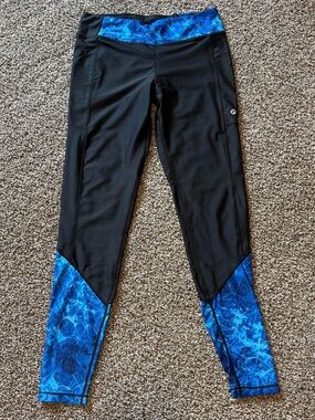 Pelagic Black Leggings with Electric Blue Accents